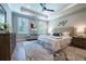 Spacious main bedroom with large windows and a tray ceiling at 1702 Eastside Parc St, Atlanta, GA 30316