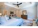 Bright and airy main bedroom boasts hardwood floors, sitting area, and ensuite bathroom, exuding comfort and style at 1702 Eastside Parc St, Atlanta, GA 30316