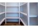 Walk-in pantry with custom shelving and plenty of storage space for all your kitchen needs at 1702 Eastside Parc St, Atlanta, GA 30316