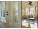 Cozy screened porch with seating, ideal for enjoying the outdoors at 1702 Eastside Parc St, Atlanta, GA 30316