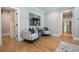 This sitting area features hardwood floors and is located just off of the main bedroom and ensuite bathroom at 1702 Eastside Parc St, Atlanta, GA 30316