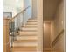 Staircase featuring oak treads, black iron spindles and access to basement at 1702 Eastside Parc St, Atlanta, GA 30316