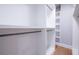 Organized walk-in closet with custom shelving and ample storage space for clothing and accessories at 1702 Eastside Parc St, Atlanta, GA 30316