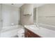 Bathroom featuring a tub, granite countertop, and modern fixtures at 361 17Th Nw St # 1001, Atlanta, GA 30363