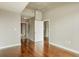 Spacious bedroom with hardwood floors and access to the bathroom and closet at 361 17Th Nw St # 1001, Atlanta, GA 30363