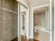 Hallway with closet, bathroom, tile floor and hardwood floors at 361 17Th Nw St # 1001, Atlanta, GA 30363