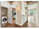Modern condo with in-unit laundry, open kitchen, breakfast bar, and city views from the living area's sliding glass door at 361 17Th Nw St # 1001, Atlanta, GA 30363