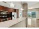 Open-concept kitchen featuring stainless steel appliances, granite countertops, and an adjacent living space at 361 17Th Nw St # 1001, Atlanta, GA 30363