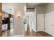 Open-concept kitchen featuring stainless steel appliances, dark wood cabinets, and modern finishes at 361 17Th Nw St # 1001, Atlanta, GA 30363