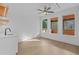 A cozy bar area includes a sink, counter space and floating wood shelves at 159 Shadburn Ferry Rd, Buford, GA 30518