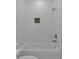 Cozy bathroom featuring a tiled shower/tub combination with modern fixtures at 159 Shadburn Ferry Rd, Buford, GA 30518