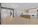Open concept living and kitchen area with hardwood floors and modern finishes at 159 Shadburn Ferry Rd, Buford, GA 30518