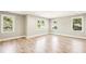 Bright and airy bedroom with hardwood floors and large windows at 2611 Charlesgate Ave, Decatur, GA 30030
