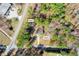 Aerial view of the property, showing the home, shed, boundaries, and surrounding land at 2420 Green Rd, Loganville, GA 30052