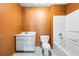 Cozy bathroom featuring a single sink vanity, standard toilet, and bathtub-shower combo at 2420 Green Rd, Loganville, GA 30052