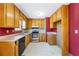 Kitchen featuring wood cabinets, laminate countertops and stainless-steel appliances at 2420 Green Rd, Loganville, GA 30052