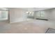 Spacious basement with neutral carpet and recessed lighting at 940 Waters Reach Ct, Alpharetta, GA 30022