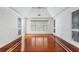Bright bedroom with wood floors, crown molding and natural light at 940 Waters Reach Ct, Alpharetta, GA 30022
