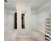 Large walk-in closet offering ample shelving and storage space at 940 Waters Reach Ct, Alpharetta, GA 30022