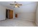 Cozy bedroom featuring carpeted floors and neutral walls, illuminated by a ceiling fan at 1201 Keencheefoonee Rd, Rutledge, GA 30663