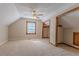 Neutral bedroom with a ceiling fan, closet, carpeted floors and bright natural light at 1201 Keencheefoonee Rd, Rutledge, GA 30663