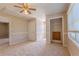 Spacious bedroom features neutral walls and access to an attic or storage area at 1201 Keencheefoonee Rd, Rutledge, GA 30663