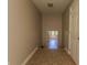 Hallway featuring tile floors leading into another room at 1201 Keencheefoonee Rd, Rutledge, GA 30663