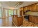 Kitchen with wood cabinets, granite countertops, stainless steel appliances, and bay window breakfast nook at 1201 Keencheefoonee Rd, Rutledge, GA 30663