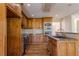 Traditional kitchen with granite counters, custom cabinets, and stainless appliances at 1201 Keencheefoonee Rd, Rutledge, GA 30663