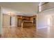 Open concept living room boasts hardwood floors and adjoins kitchen at 1201 Keencheefoonee Rd, Rutledge, GA 30663