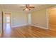Inviting main bedroom with neutral walls and hardwood flooring at 1201 Keencheefoonee Rd, Rutledge, GA 30663