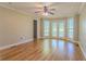 Bright main bedroom with french doors and hardwood floors at 1201 Keencheefoonee Rd, Rutledge, GA 30663