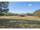 Picture of a rustic outbuilding nestled in a spacious yard at 1201 Keencheefoonee Rd, Rutledge, GA 30663