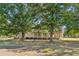 Charming home featuring a full-length rear porch, perfect for relaxing and enjoying the outdoors at 1201 Keencheefoonee Rd, Rutledge, GA 30663