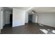Spacious living room with stylish floors and neutral tones, perfect for modern living at 698 Rocky Plains Rd, Covington, GA 30016