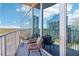 Cozy balcony with comfortable seating and panoramic views of the city skyline at 860 Peachtree Ne St # 1903, Atlanta, GA 30308