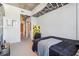 Contemporary bedroom with geometric wall design, view of laundry, and comfortable furnishings at 860 Peachtree Ne St # 1903, Atlanta, GA 30308