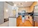 Well-equipped kitchen with stainless steel appliances, ample cabinetry, and a functional island at 860 Peachtree Ne St # 1903, Atlanta, GA 30308