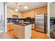 Contemporary kitchen featuring stainless steel appliances, a center island, and ample storage at 860 Peachtree Ne St # 1903, Atlanta, GA 30308