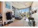 Open-concept living area with cityscape view, sofa, and distinct geometric wall design at 860 Peachtree Ne St # 1903, Atlanta, GA 30308
