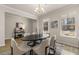 Bright dining room with hardwood floors, chandelier, and modern dining set at 495 Hancock Se Dr, Atlanta, GA 30354