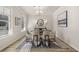Bright dining room with hardwood floors, chandelier, and modern dining set at 495 Hancock Se Dr, Atlanta, GA 30354
