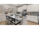 Modern kitchen with white cabinets, granite countertops, and stainless steel appliances at 495 Hancock Se Dr, Atlanta, GA 30354