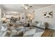 Open concept living room with comfortable seating and views to kitchen and stairs at 495 Hancock Se Dr, Atlanta, GA 30354
