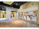 Inviting lounge area boasts a tiled floor, a modern bar with seating, and stone accents at 400 17Th Nw St # 2120, Atlanta, GA 30363