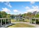 Picturesque community view with a pond, bridge, statue, and walking paths at 400 17Th Nw St # 2120, Atlanta, GA 30363