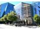 Exterior architecture features an office building with a modern glass facade and landscaping at 400 17Th Nw St # 2120, Atlanta, GA 30363