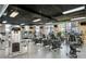 Well-equipped gym with high ceilings, contemporary lighting, and a diverse range of modern exercise machines at 400 17Th Nw St # 2120, Atlanta, GA 30363