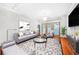 Bright living area featuring hardwood floors, large windows and modern decor at 400 17Th Nw St # 2120, Atlanta, GA 30363