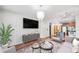 Bright living space with hardwood floors, modern lighting, and an open floor plan at 400 17Th Nw St # 2120, Atlanta, GA 30363
